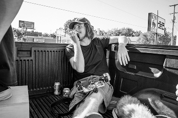 Parker talking into a radio on set of The Collins Film photo credit: Jordan Skutar